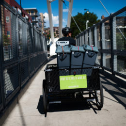 DENVER, CO - JULY 21: Scraps intern Joel Cruz bikes through the streets of Denver, Colorado to collect compost from their clients on July 21, 2017. (Photo by Gabriel Scarlett/The Denver Post)